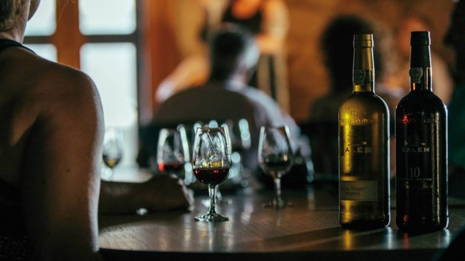 Experience a slow-paced Douro River cruise in Portugal aboard a charming wooden boat, exploring vineyard-covered hillsides and enjoying exclusive wine tastings in the heart of the Douro Valley.