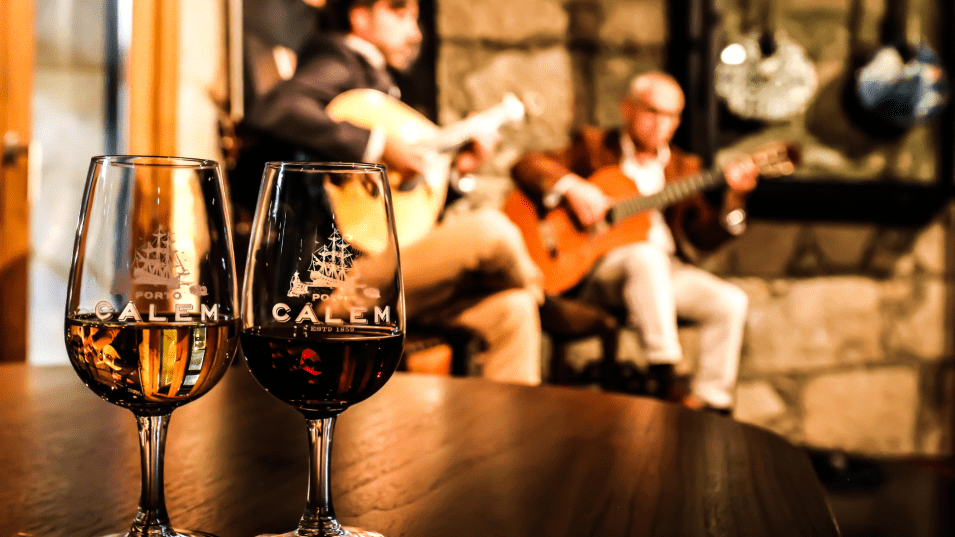 Experience a slow-paced Douro River cruise in Portugal aboard a charming wooden boat, exploring vineyard-covered hillsides and enjoying exclusive wine tastings in the heart of the Douro Valley.